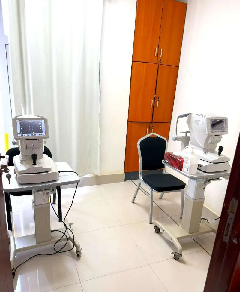 The clean and modern examination and scan department at KELH, featuring multiple advanced ophthalmic diagnostic machines.